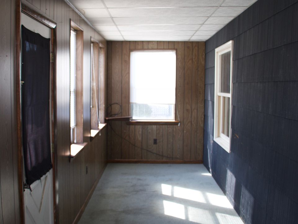 Front Entrance Opens To A Large, Private, Finished Enclosed