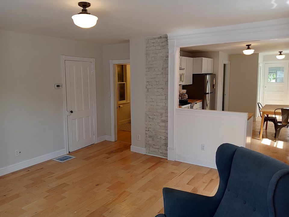 living/kitchen with access to full bathroom #1 of 2.