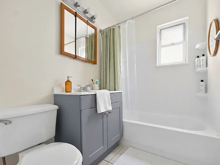 Step into comfort with a beautifully designed bathroom at Patchogue Village at Maple, an Eagle Rock Community. Modern finishes, ample storage, and natural light create an inviting atmosphere. Elevate your lifestyle today!