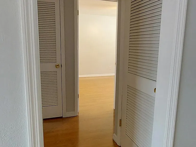 Primary bedroom to the right off the hallway.