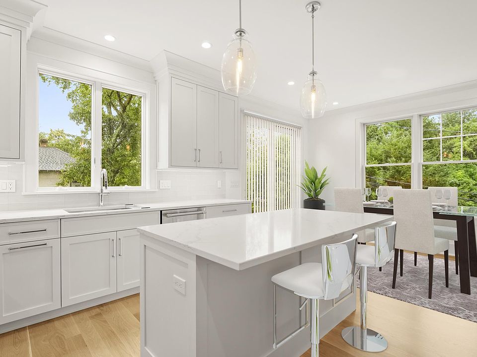 GOURMET KITCHEN w/Custom Cabinetry, Quartz Countertops, Thermador Appliances, Breakfast Island