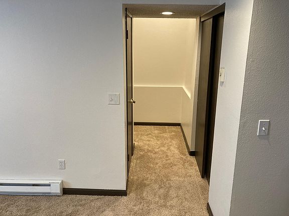 Hallway to second entrance of the apartment/ Closets