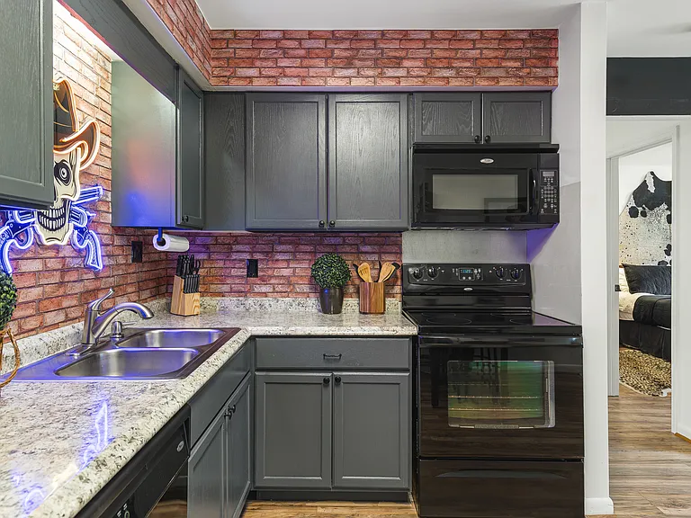 Fully equipped kitchen for all of your cooking needs! Dining table with seating for 4.