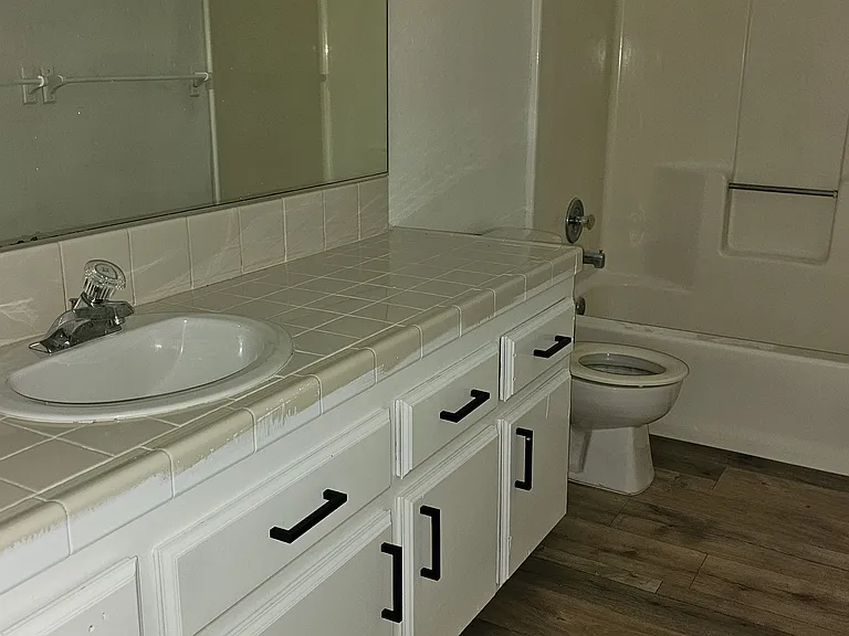 Bathroom with lots of cabinet spaces