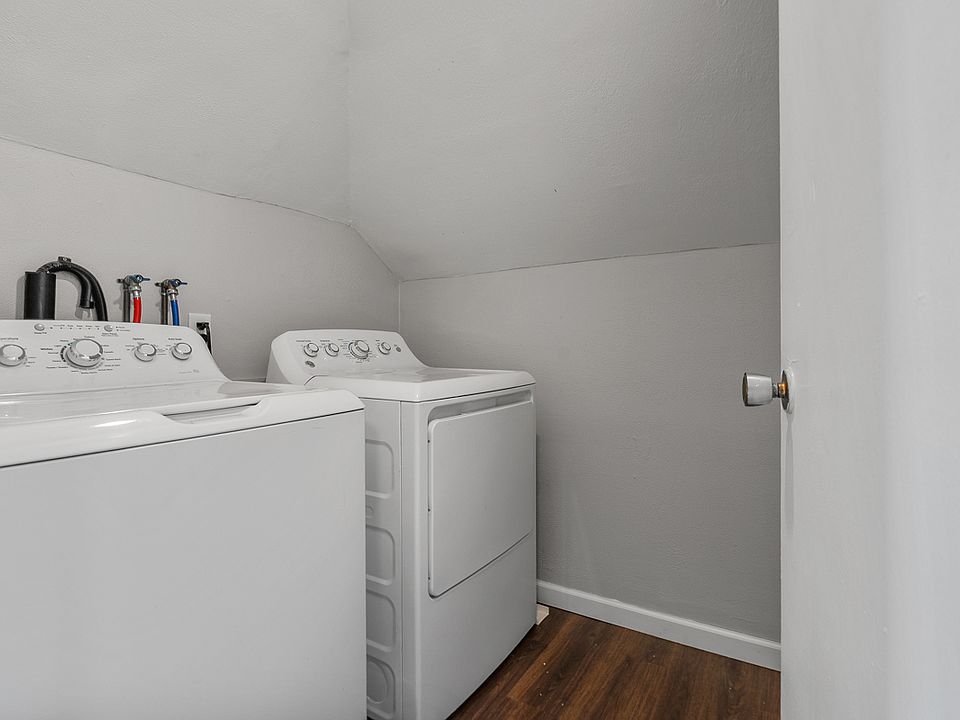 Large in uinit Laundry room with washer and dryer included in unit.