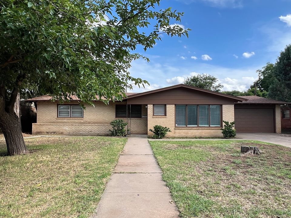 Outside with 2 car garage