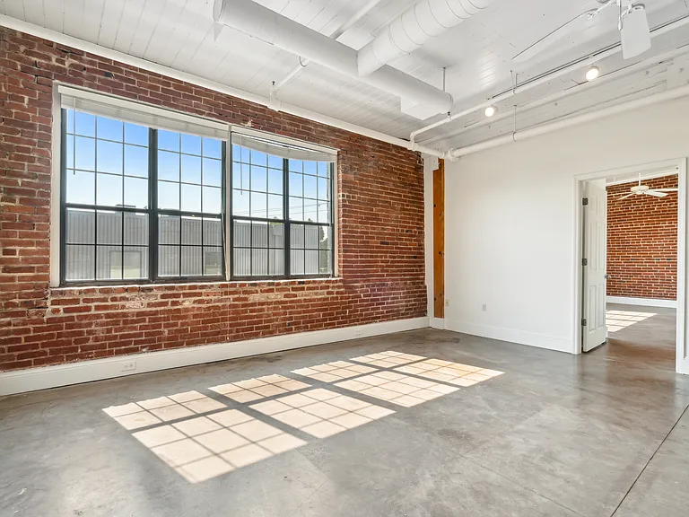 Exposed Brick w/ Big Windows