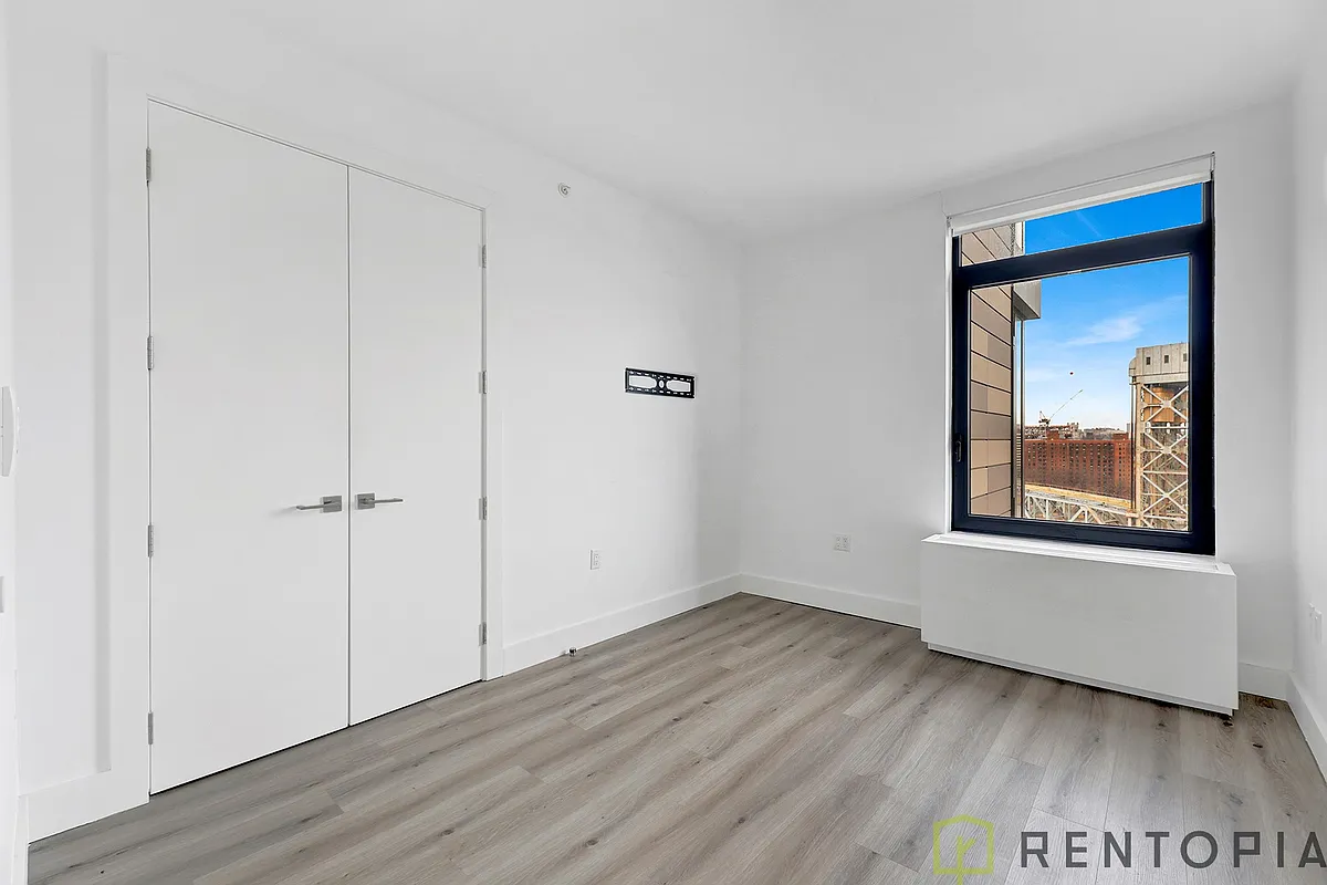 Building Photo - 224 E 135th St #1223S
