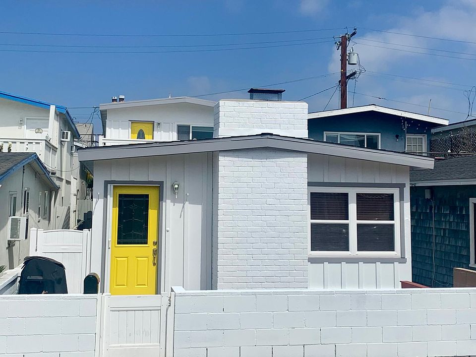 Exterior of home - the available unit is the upstairs back unit