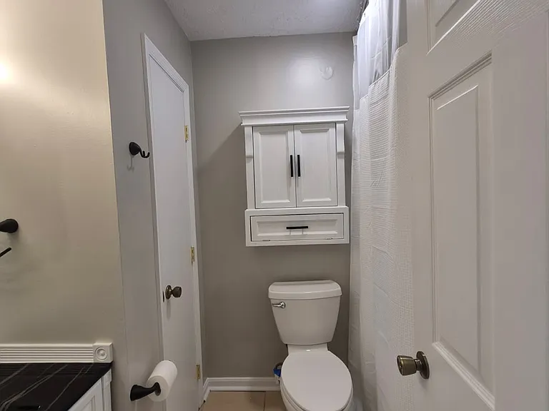 Closet and cabinet provide great storage.