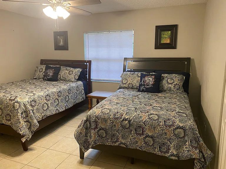 1st bedroom with queen and full size beds
