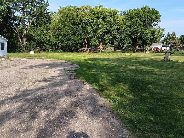 1.3 acre fenced land, maintained by owner. Quiet as house 160" off street ,security light