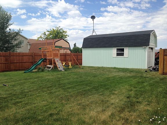 Back yard with a large shop