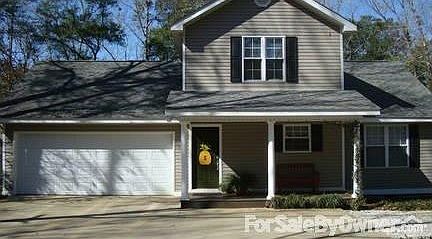 WHAT A BUNGALOW!! : Sitting on a beautiful wooded, lake front lot.