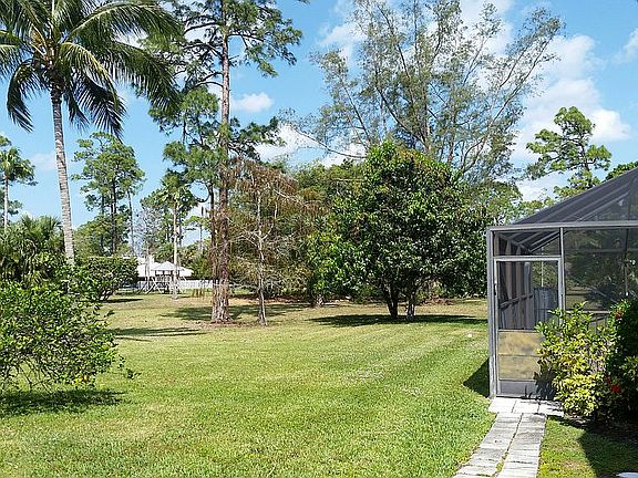 Side yard looking at canal