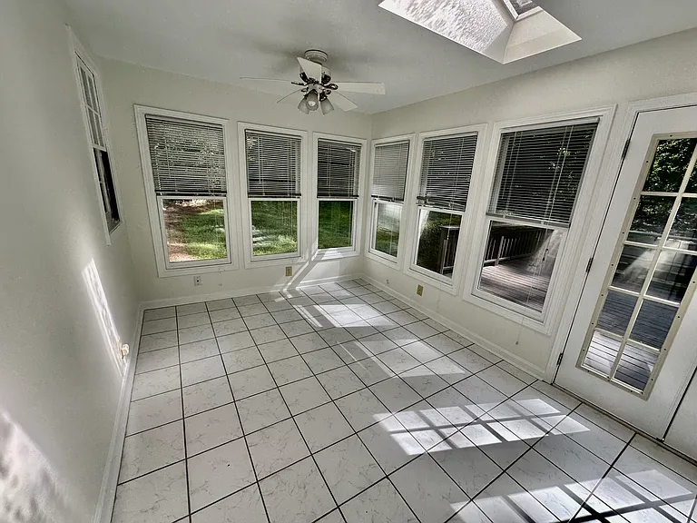 Sunroom with a view to the deck.