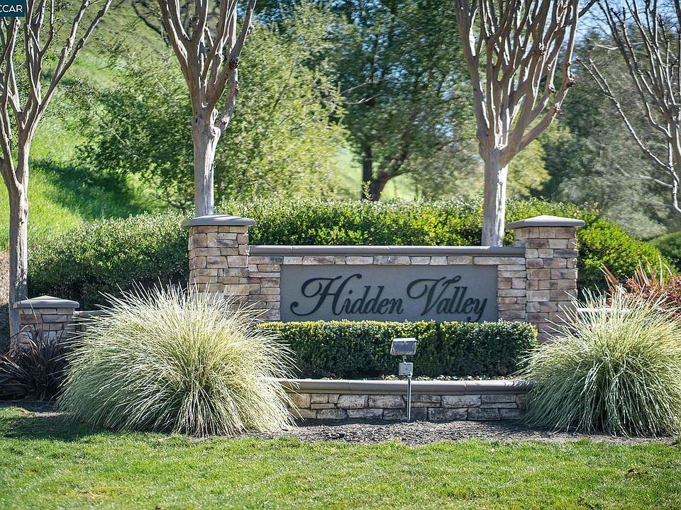 Scenic and serene drive into entry of development.