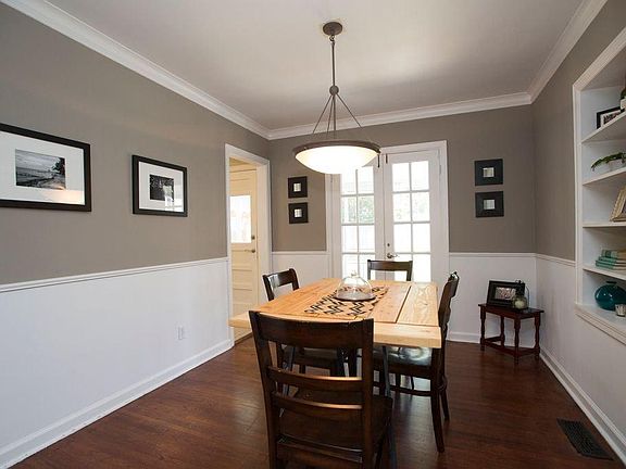 Dining Room with french doors and built in shelves