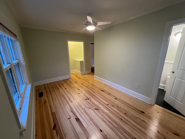primary bedroom with full bath
