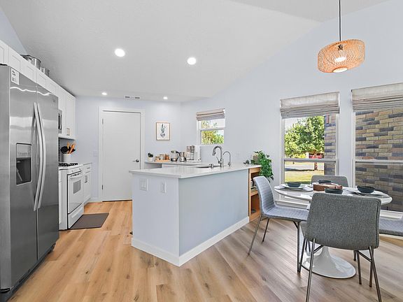 Open concept living, dining, kitchen.