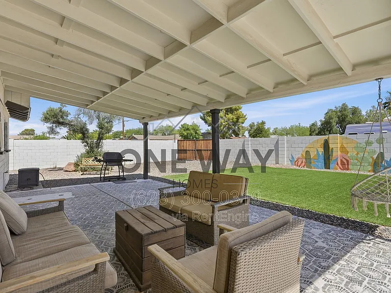 8702 E Sheridan St — Photo 23