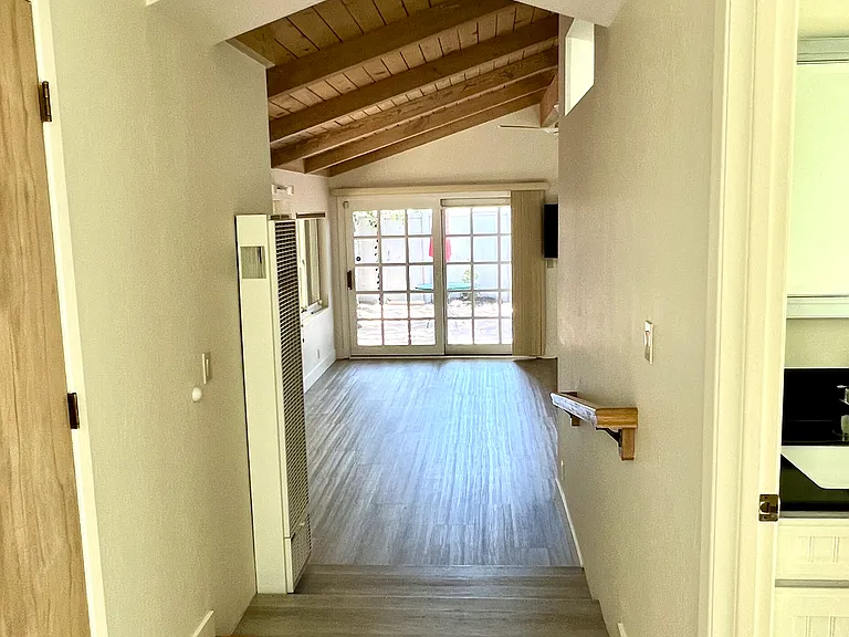 hallway - entry to full bathroom on right, half bathroom on left