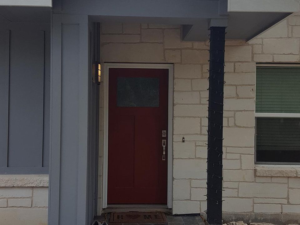 Side A front door with slate covered porch