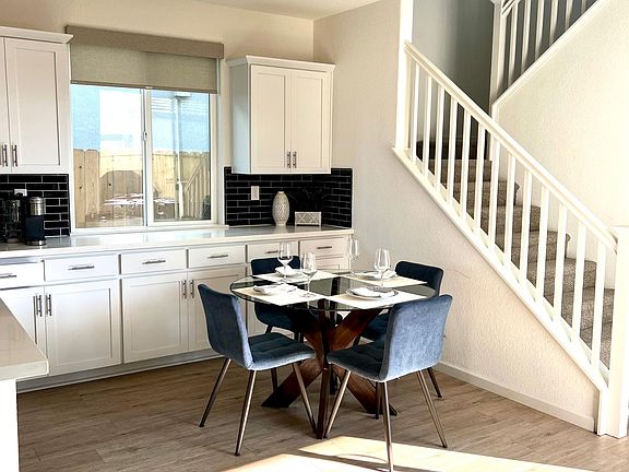 Dining space with wrap around cabinets