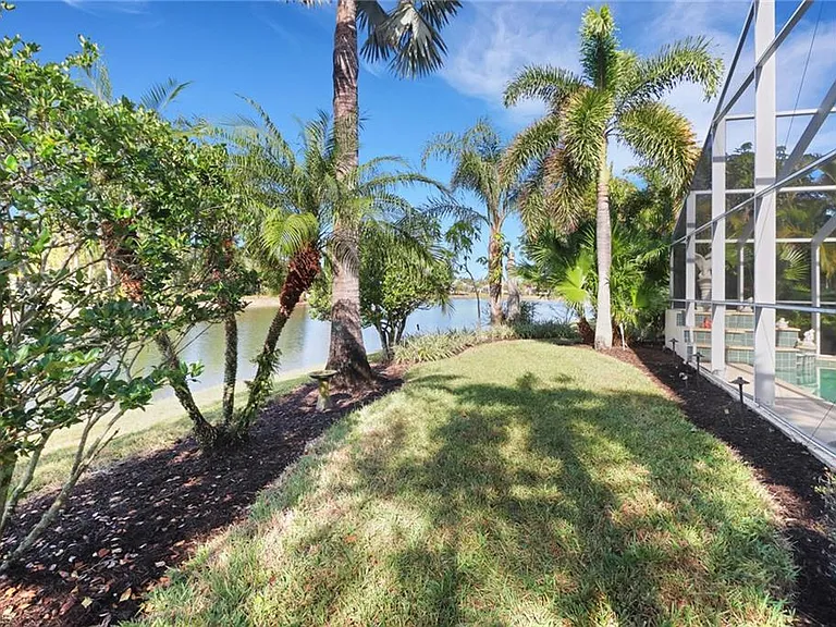 7477 Lourdes Ct — Photo 24