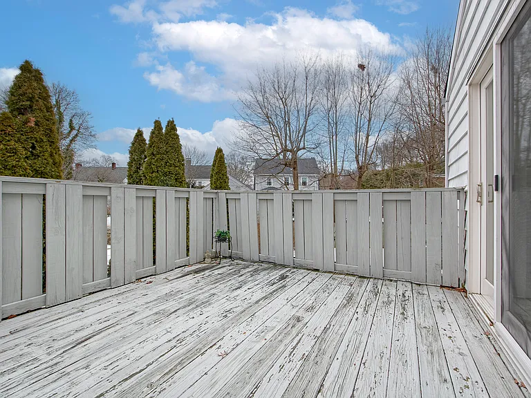 113.5" x 11'5" Private deck. This will be painted in the spring