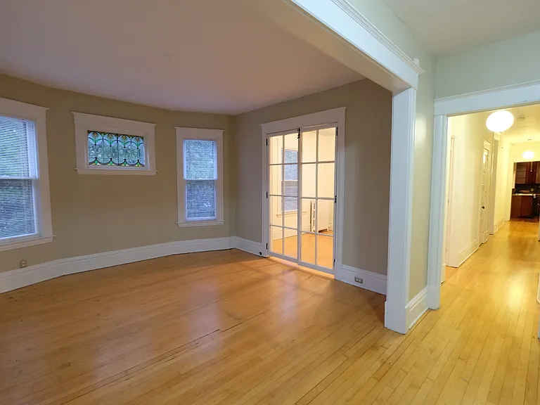 Welcome to Central Lakes of Uptown, where elegance meets comfort in every corner. This spacious, well-lit living area features stunning hardwood floors and inviting natural light. Make this your new home today! Schedule a tour now.
