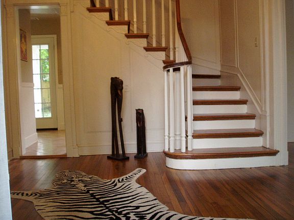 DRAMATIC FOYER, CURVED STAIRCASE, REFINISHED FLOORS