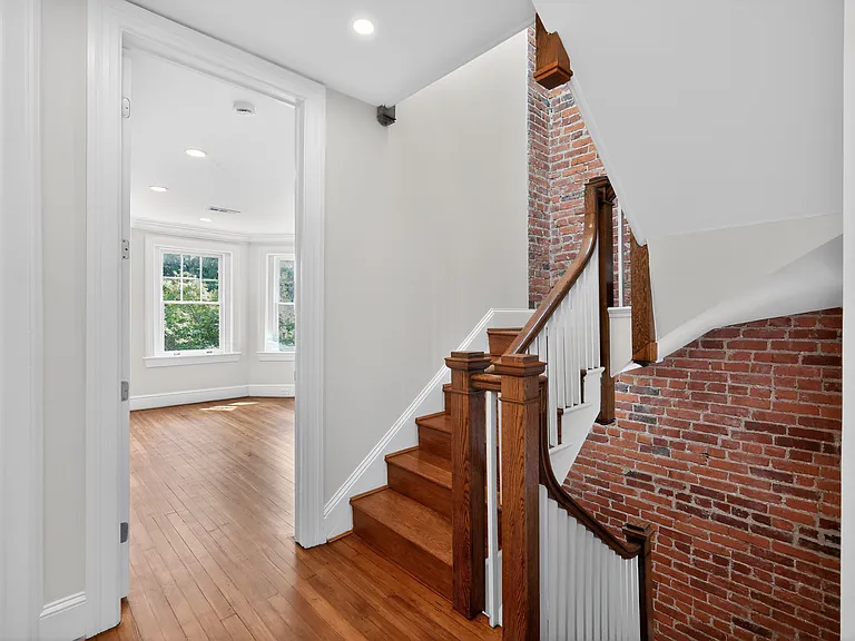Ornate stairway to third floor.