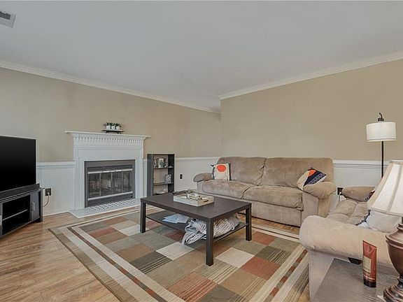 Spacious living room with fireplace