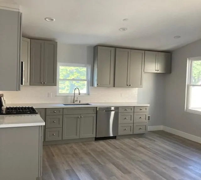 Kitchen provides stainless steel stove, microwave and dishwasher.