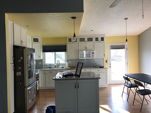 Dining area and access to upper deck. Great afternoon light!