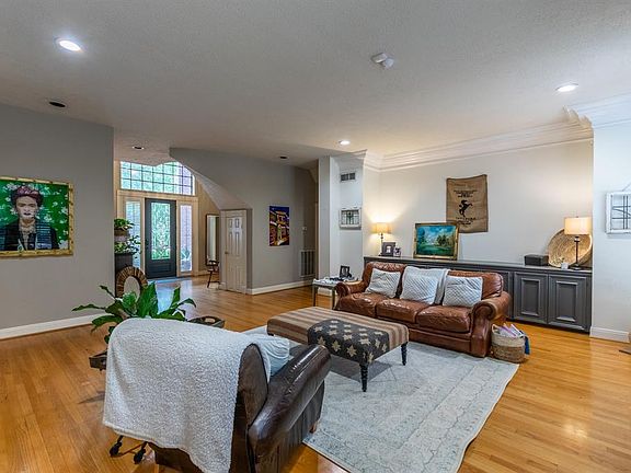 The stunning leaded glass front door with 2 story entry