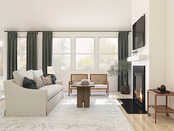 Great room with vaulted ceiling and fireplace