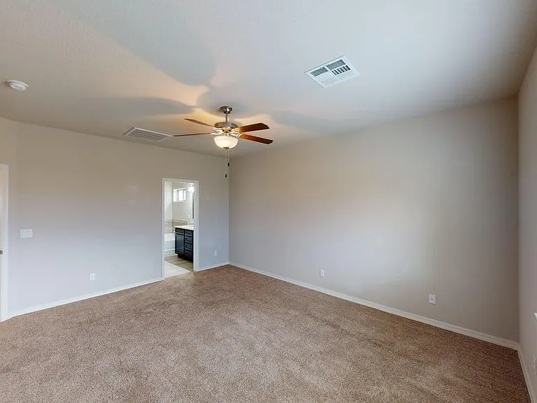 Spacious Zoned Primary Bedroom
