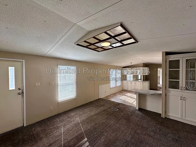 9499 Wendi Dr NE #J — Photo 4