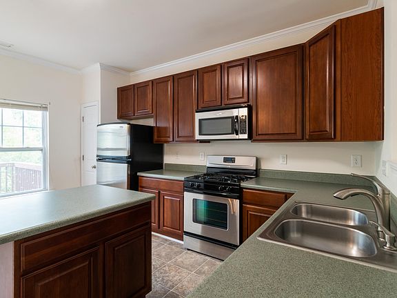 Kitchen with all stainless steel appliances.