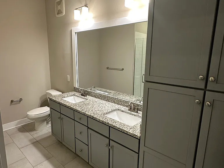 Large bathroom with double vanity and lots of storage