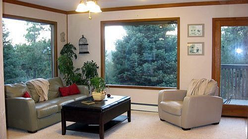 Up stairs living room with view of Pikes Peak