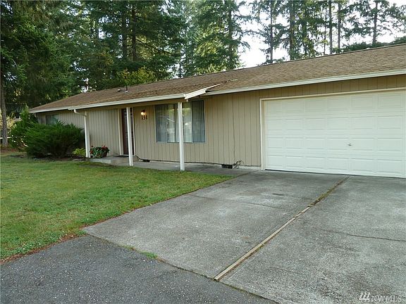 Great covered porch and 2-car garage.