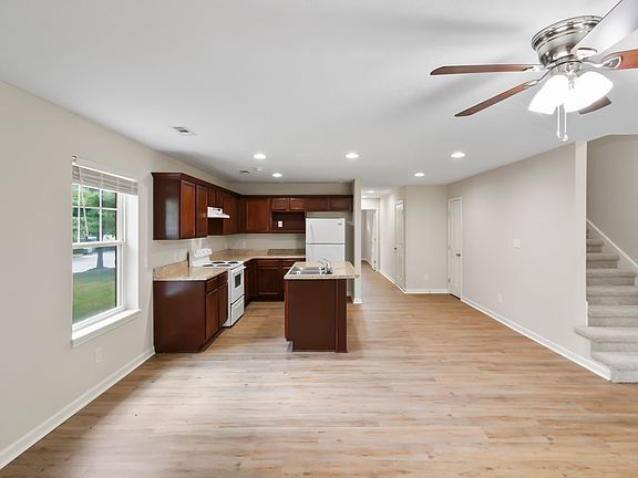 Living Room/Kitchen Area. Open Floor Plan with Luxury Vinyl Tile (LVT)