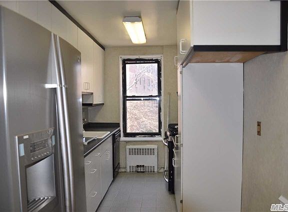 5th image of 8385 Woodhaven Blvd APT 2H