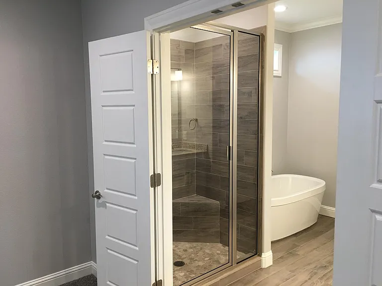 Master Bath Entrance and Tile Shower and Tub