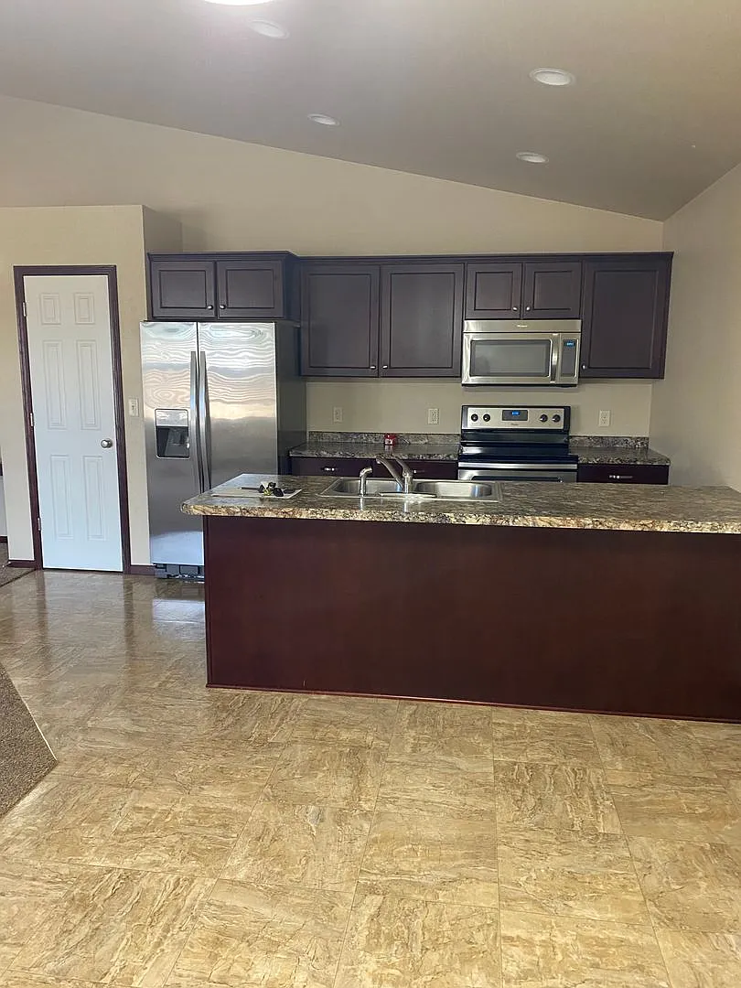 Enjoy Quiet Living In A Quality Built Twinhome — Photo 1