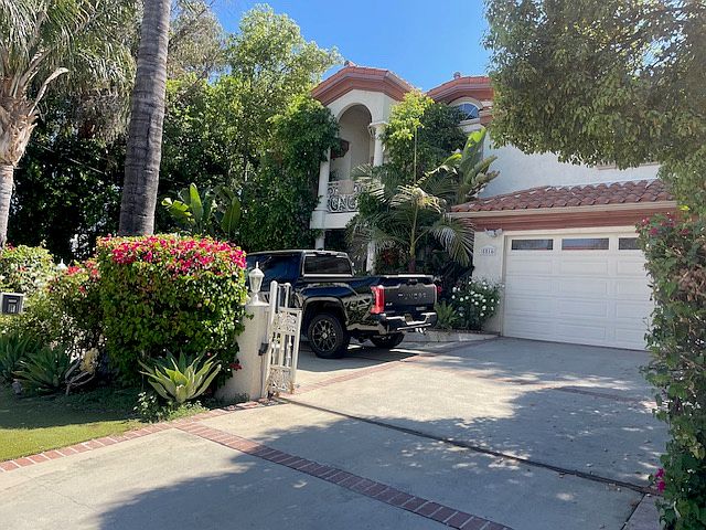 Front of Property w/ Electric Gate Access and Turnaround Driveway.