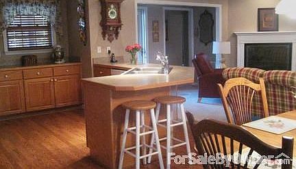 Kitchen/Dining/Living Room View
						:
						A partial view of the open living space